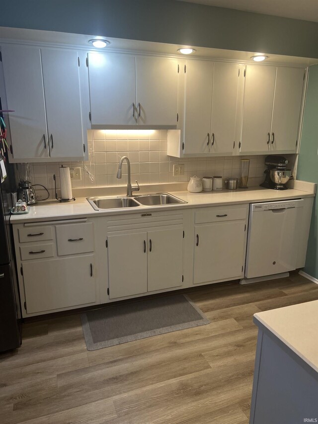 4116 N Lancaster Dr, Muncie, IN 47304 - kitchen with a sink, dishwasher, and light countertops