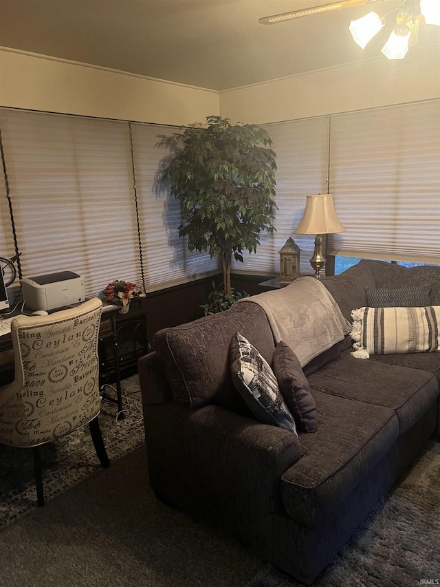 4116 N Lancaster Dr, Muncie, IN 47304 - living area with carpet floors and a ceiling fan