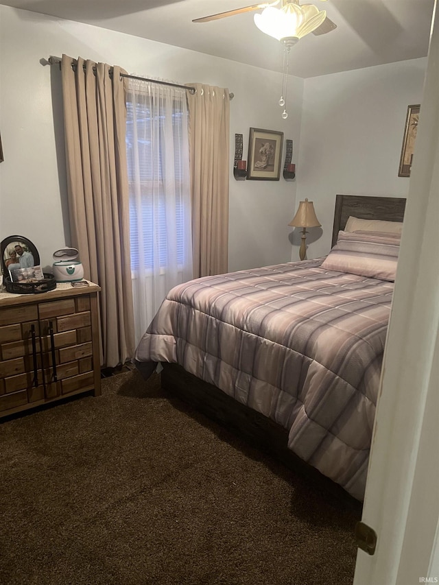 4116 N Lancaster Dr, Muncie, IN 47304 - carpeted bedroom featuring a ceiling fan