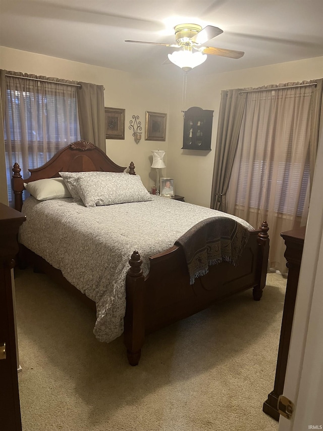 4116 N Lancaster Dr, Muncie, IN 47304 - bedroom featuring ceiling fan and light carpet