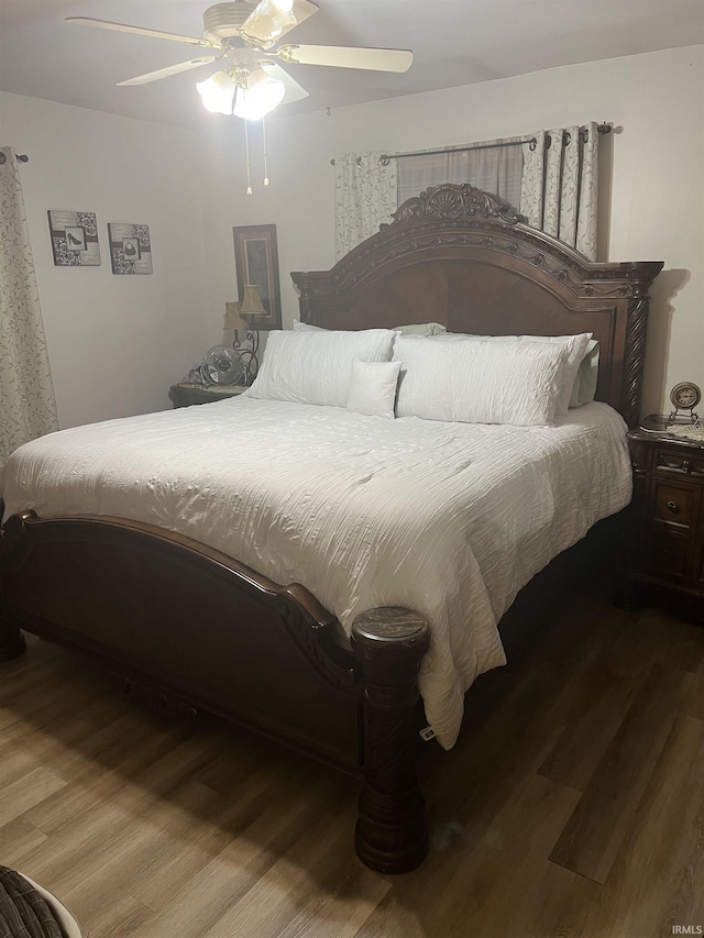 4116 N Lancaster Dr, Muncie, IN 47304 - bedroom featuring a ceiling fan and wood finished floors