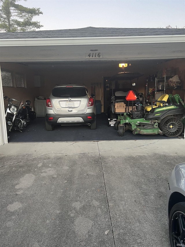 4116 N Lancaster Dr, Muncie, IN 47304 - garage featuring a garage door opener
