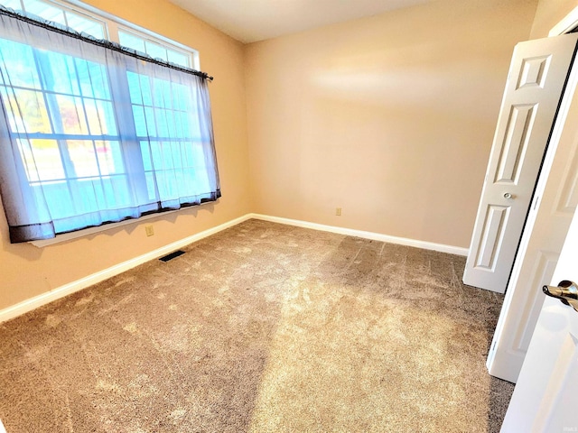 view of carpeted empty room