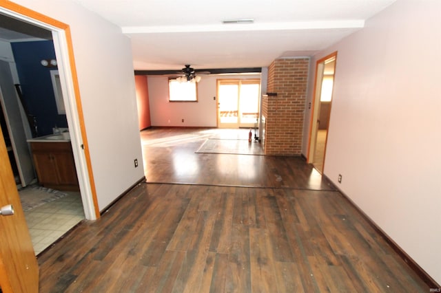 hall featuring dark wood-type flooring