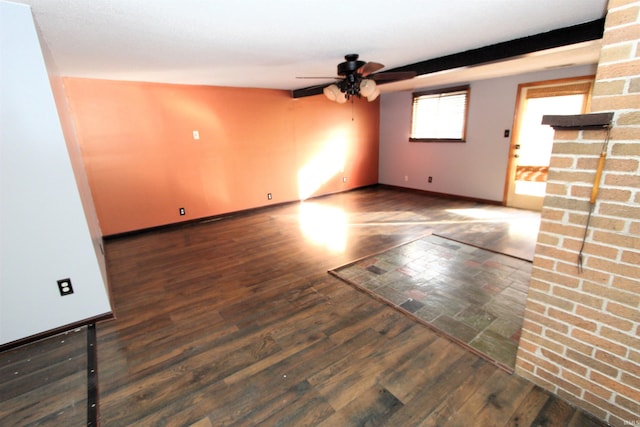 spare room with dark wood-type flooring, ceiling fan, and lofted ceiling