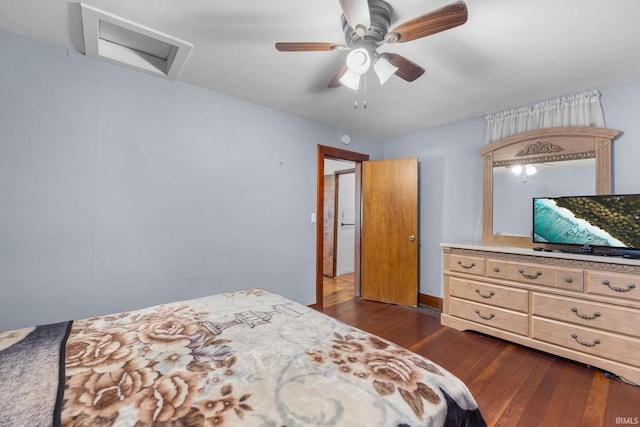 bedroom with dark hardwood / wood-style floors and ceiling fan