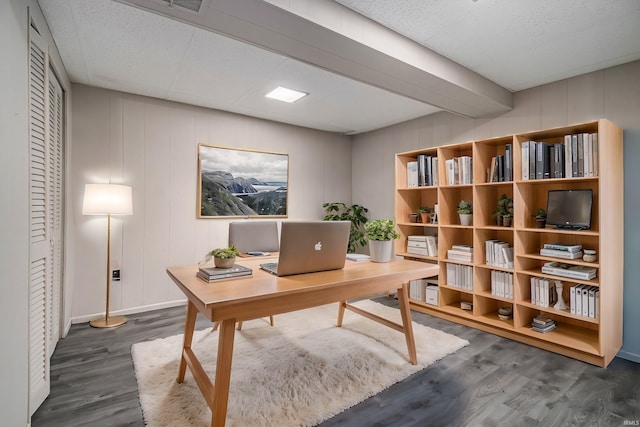 office with dark wood-type flooring