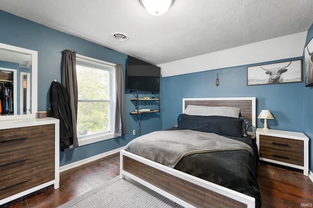1316 S 19th St, New Castle, IN 47362 - bedroom featuring hardwood / wood-style floors, baseboards, and a textured ceiling
