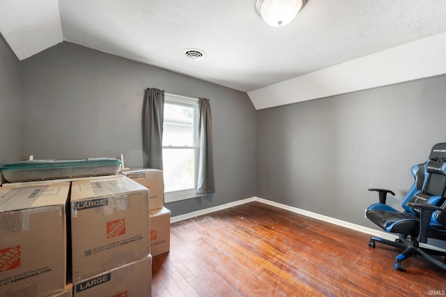 1316 S 19th St, New Castle, IN 47362 - unfurnished office with vaulted ceiling, baseboards, and wood-type flooring