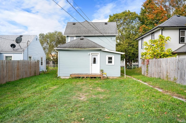 1316 S 19th St, New Castle, IN 47362 - back of property with roof with shingles and a wooden deck