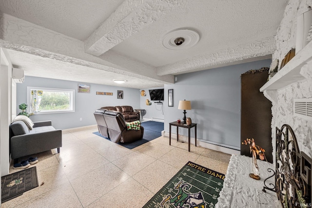 living room with a baseboard heating unit, a fireplace, a textured ceiling, beamed ceiling, and a wall mounted AC