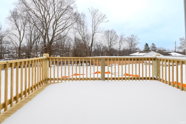 view of snow covered deck