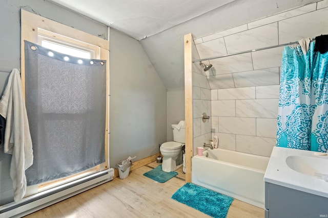 full bathroom featuring a baseboard heating unit, hardwood / wood-style floors, vanity, and lofted ceiling