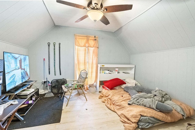 bedroom featuring wood-type flooring, ceiling fan, and lofted ceiling