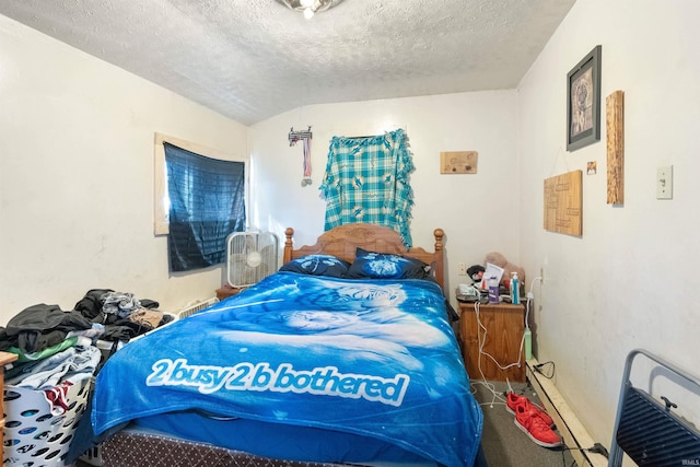 bedroom featuring a textured ceiling