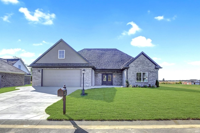 view of front facade featuring a front yard and a garage