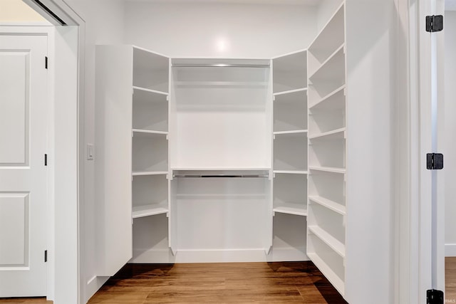 4711 Lemon Grass Ct, Evansville, IN 47725 - walk in closet featuring wood finished floors
