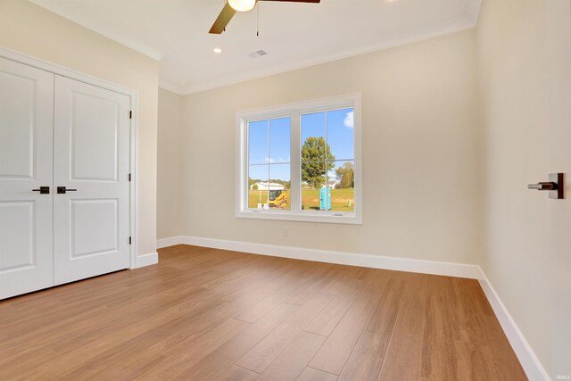 4711 Lemon Grass Ct, Evansville, IN 47725 - unfurnished bedroom featuring light wood-style floors, a ceiling fan, baseboards, visible vents, and a closet