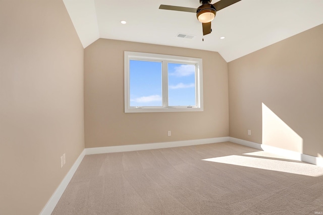 bonus room with light carpet, ceiling fan, and vaulted ceiling