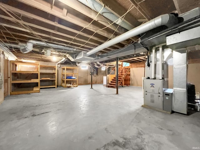 basement featuring heating unit