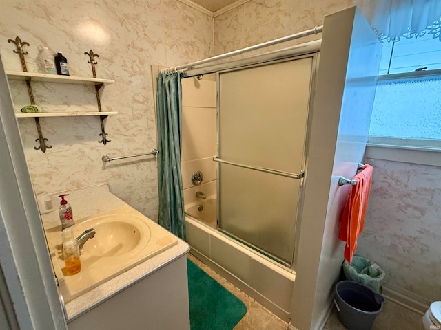 full bathroom with vanity, shower / tub combo with curtain, and toilet