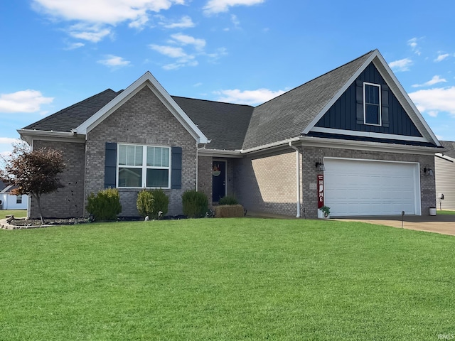 view of front of property with a front yard and a garage