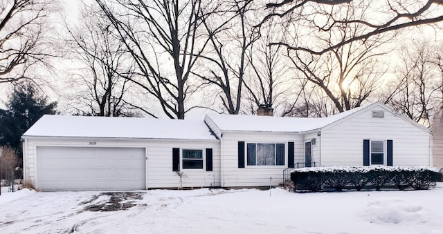 ranch-style home with a garage