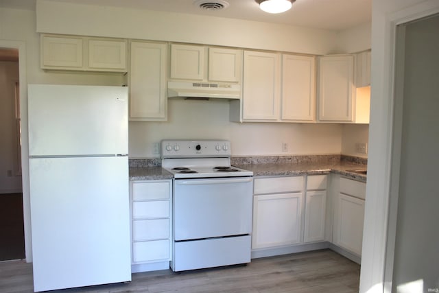 kitchen featuring white cabinets, white appliances, and light wood-type flooring