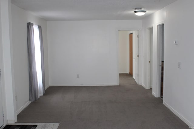 308 Clyde Ave, Angola, IN 46703 - hallway featuring baseboards and carpet flooring