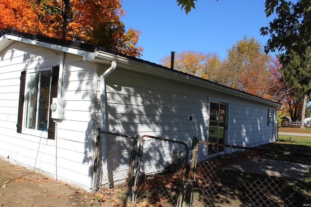 308 Clyde Ave, Angola, IN 46703 - view of property exterior with a gate and fence