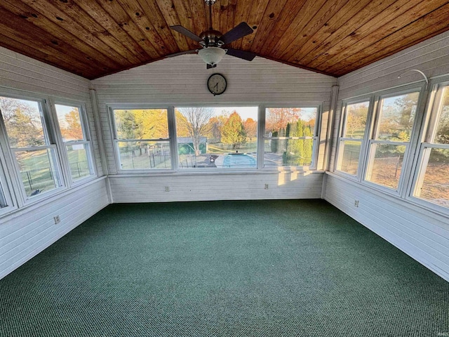 unfurnished sunroom with a ceiling fan and a wealth of natural light