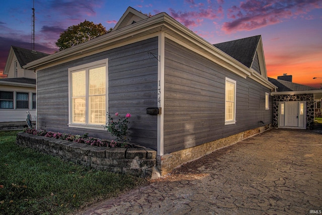 view of property exterior at dusk