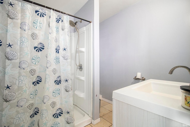 bathroom featuring a shower with curtain and tile patterned flooring