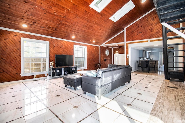 living room with a skylight, wood walls, wooden ceiling, and tile patterned floors