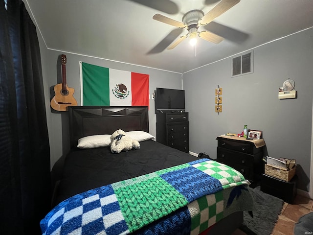 bedroom featuring ceiling fan