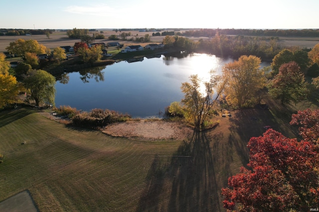 birds eye view of property with a water view and a rural view