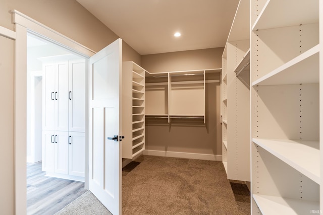 spacious closet with light wood-type flooring