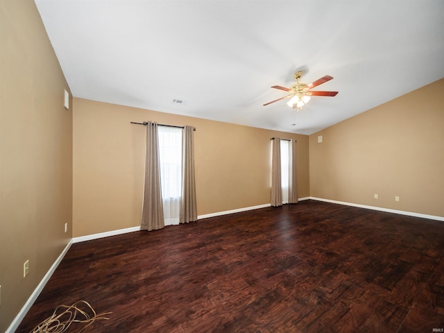 unfurnished room featuring ceiling fan and dark hardwood / wood-style flooring