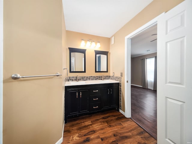 bathroom featuring vanity and hardwood / wood-style floors