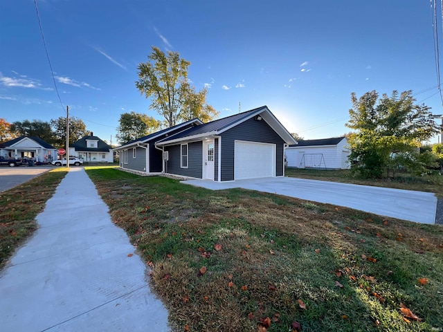 view of property exterior featuring a garage