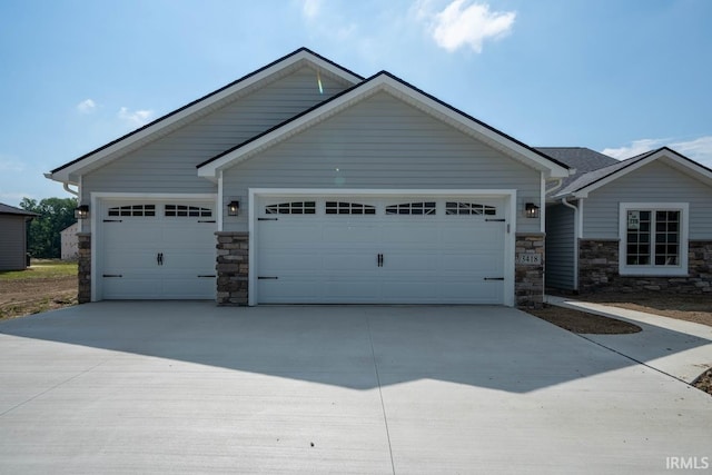 craftsman house with a garage