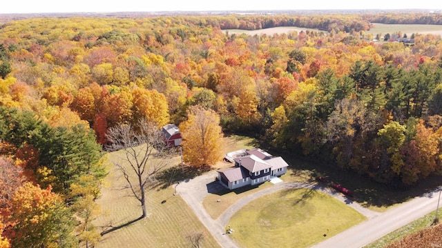 birds eye view of property with a rural view