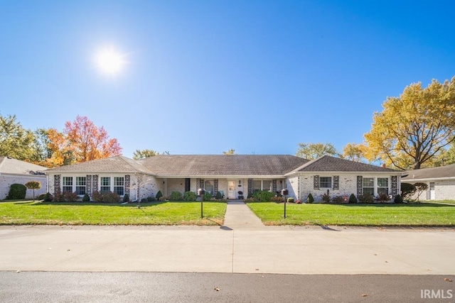 4501 N Wheeling Ave Unit 5-1A, Muncie, IN 47304 - ranch-style home with a front yard