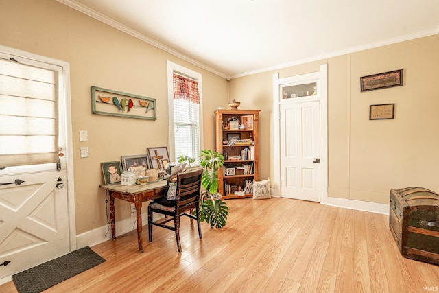 office area featuring ornamental molding and light hardwood / wood-style flooring