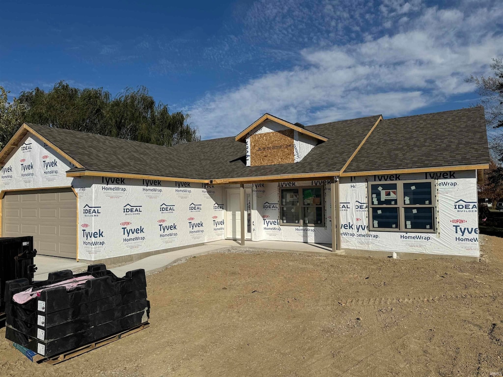 property under construction with a garage