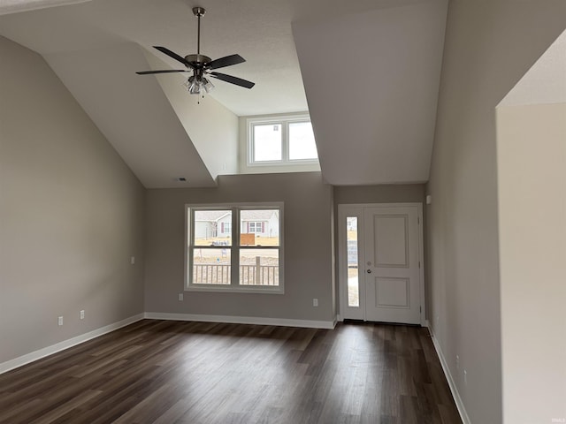 entrance foyer with ceiling fan, high vaulted ceiling, and dark hardwood / wood-style flooring