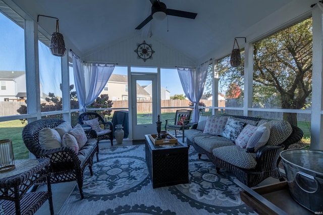 sunroom with vaulted ceiling and ceiling fan