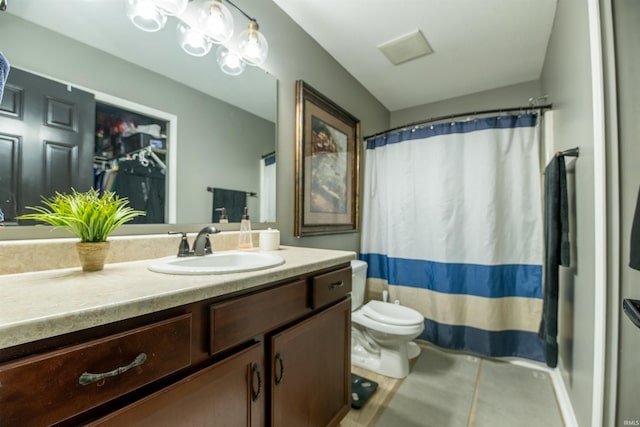 bathroom with vanity, a shower with curtain, and toilet