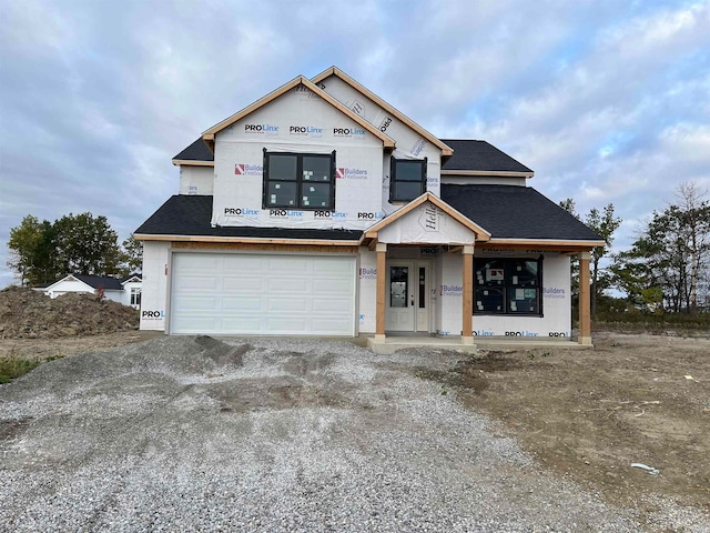 unfinished property with a garage