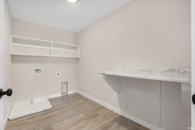 washroom featuring hardwood / wood-style floors, electric dryer hookup, and washer hookup